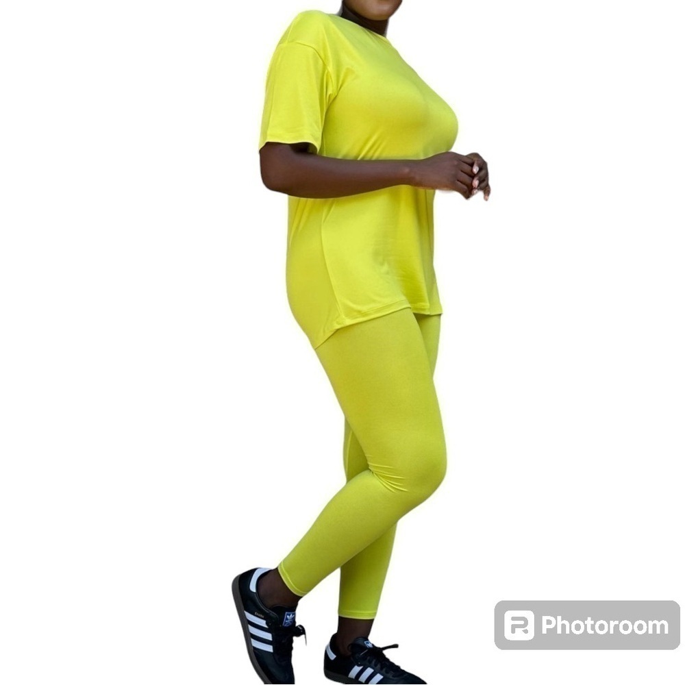 Lime green short sleeve shirt and legging set. NWT. 92 % polyester 8% spandex.